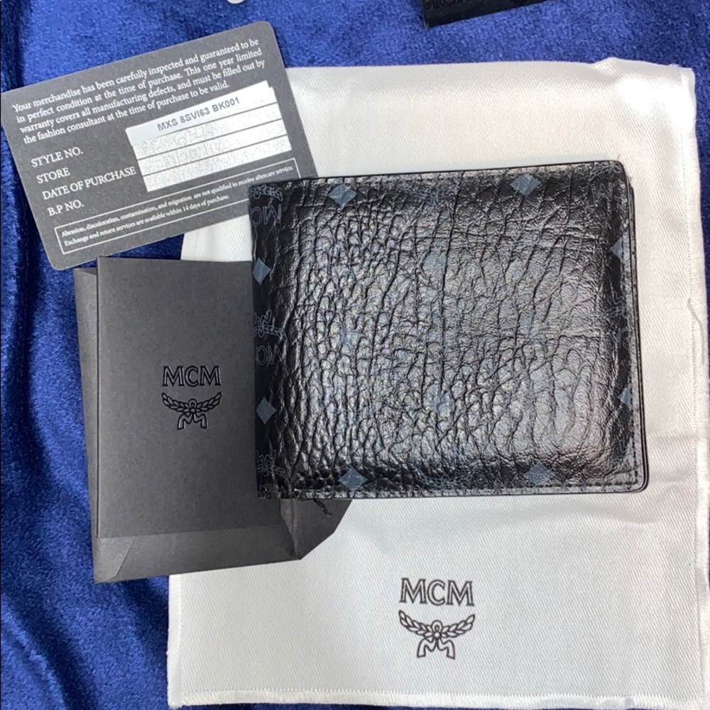 Authentic MCM wallet.... with box and case